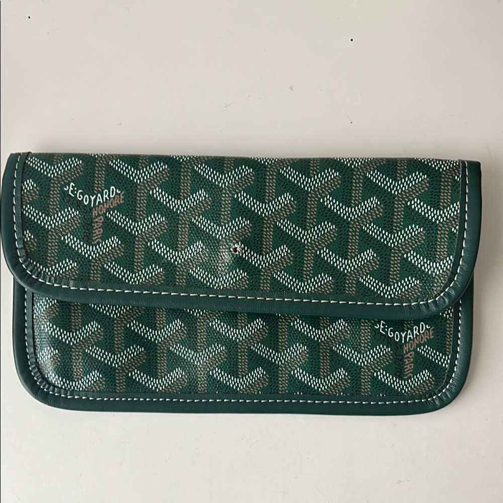 green goyard pouch